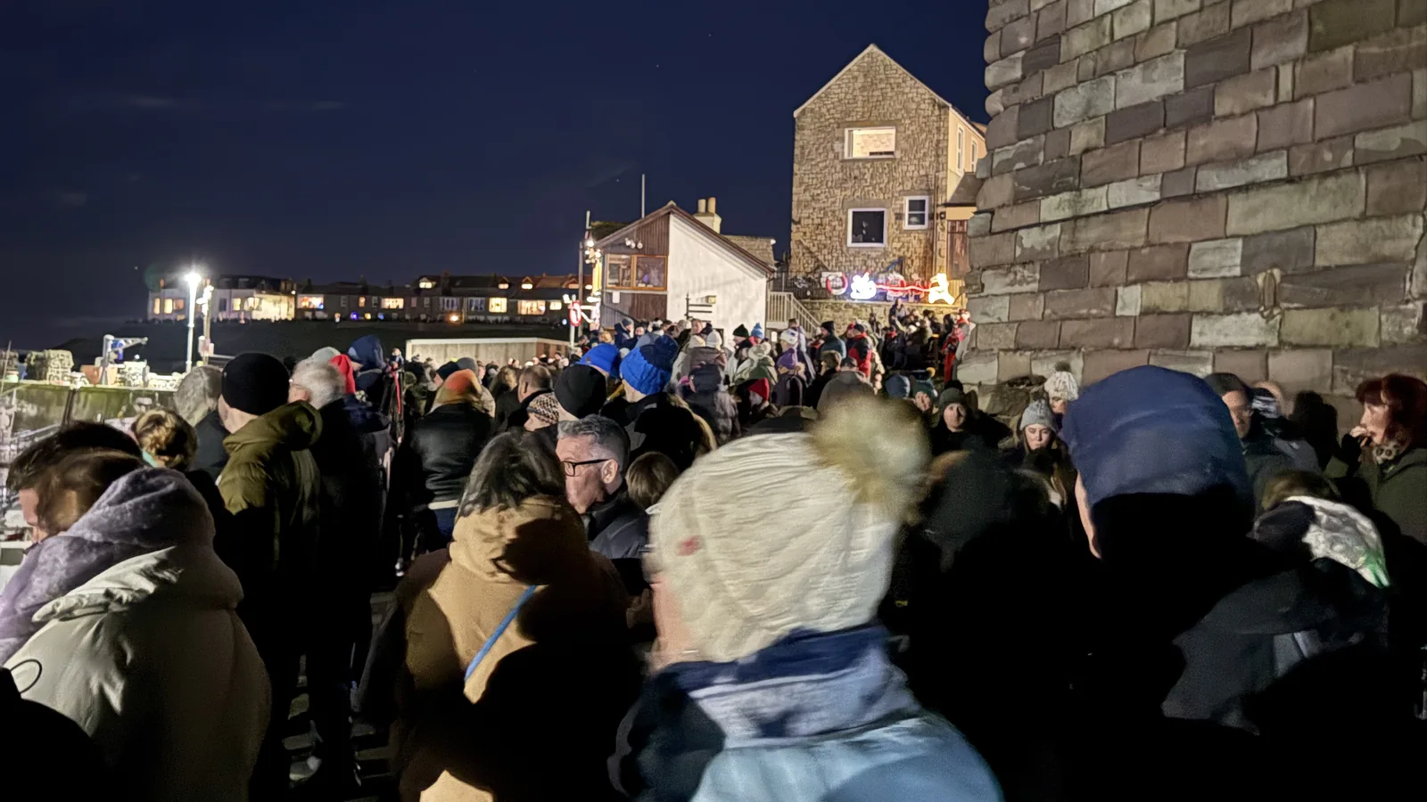 Crowd at an outdoor evening community event